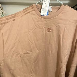 OVERSIZED STYLE RUNS LARGE